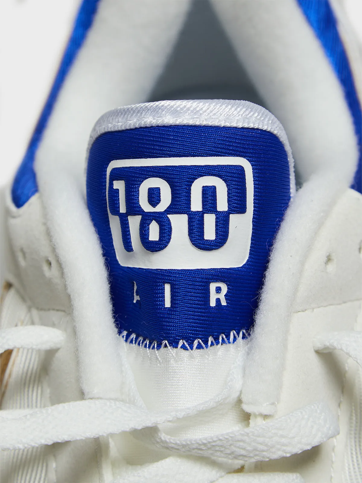 Air 180 Sneakers in Summit White and Metallic Gold